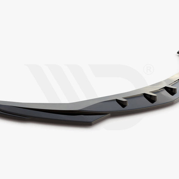 A sleek, black aerodynamic car component with fin-like protrusions rests on a plain white background. Text below reads: "Worldwide leader in aerodynamic components."