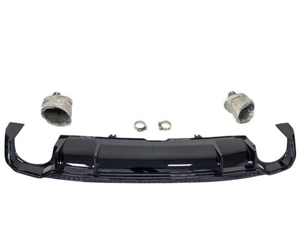 A glossy black car diffuser is centered, flanked by two wrapped exhaust tips. Two metal rings lie between the diffuser and the exhaust tips on a plain white background.