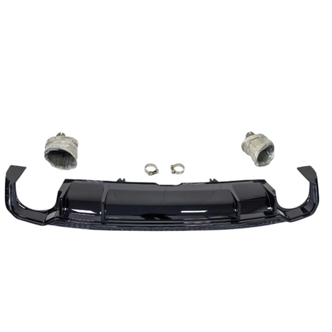 A glossy black car diffuser is centered, flanked by two wrapped exhaust tips. Two metal rings lie between the diffuser and the exhaust tips on a plain white background.