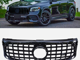 A black SUV is parked on a road near a body of water, surrounded by greenery. Below, there's a separate image of a black, grid-patterned car grille on a white background.