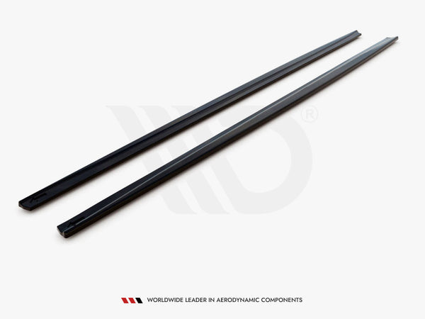 Two black, elongated strips are laid parallel on a light surface. Text reads, "WORLDWIDE LEADER IN AERODYNAMIC COMPONENTS."