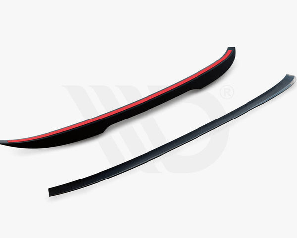 Two aerodynamic car components, both curved black strips with red accents, are placed on a white background. Text reads, "WORLDWIDE LEADER IN AERODYNAMIC COMPONENTS."