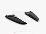 Two sleek, black aerodynamic components are positioned on a plain white background. Text at the bottom reads: 