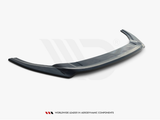 A curved, black car spoiler lies flat on a white background. Below, text reads: 
