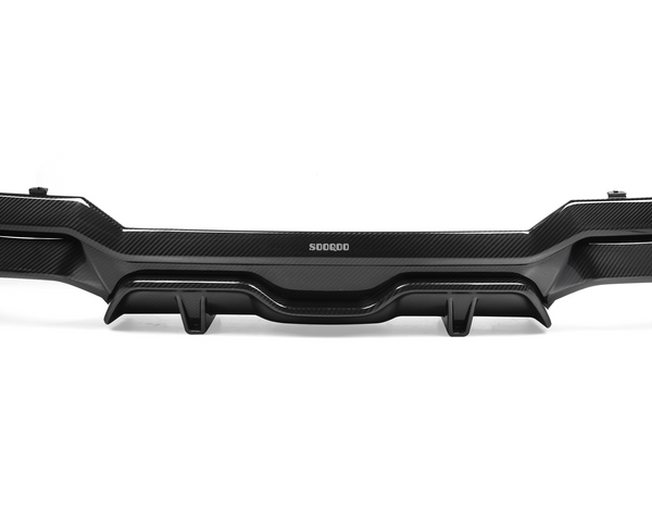 A carbon fiber car bumper, featuring a sleek design with angular contours, rests against a white background. Text "SOOQOO" is embossed on the upper center.