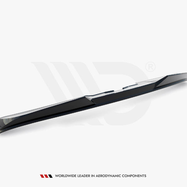 A sleek, black car spoiler lies on a plain white background. Below, the text reads: "WORLDWIDE LEADER IN AERODYNAMIC COMPONENTS."