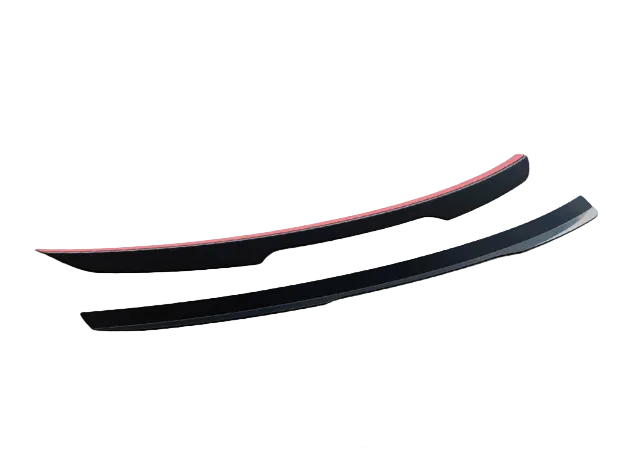 Two black aerodynamic car components with red accents rest parallel on a white background. Below them, text reads: "WORLDWIDE LEADER IN AERODYNAMIC COMPONENTS."