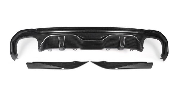 A black carbon fiber car bumper diffuser set rests on a white background, featuring aerodynamic contours and mounting points, showcasing its lightweight and sporty design.