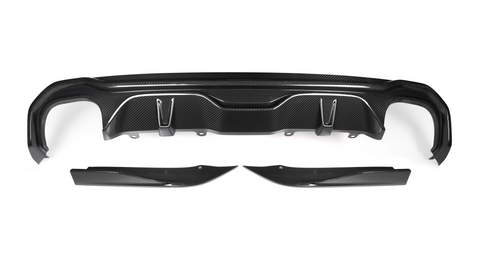 A black carbon fiber car bumper diffuser set rests on a white background, featuring aerodynamic contours and mounting points, showcasing its lightweight and sporty design.