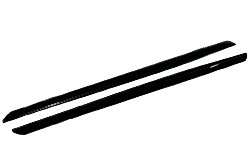 Two black chopsticks are placed parallel to each other on a plain white background.