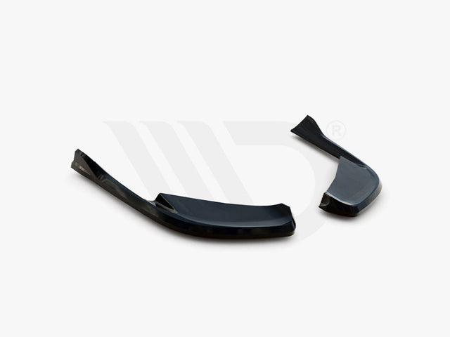 Two sleek, black aerodynamic components rest on a white background. The text below reads, "WORLDWIDE LEADER IN AERODYNAMIC COMPONENTS."