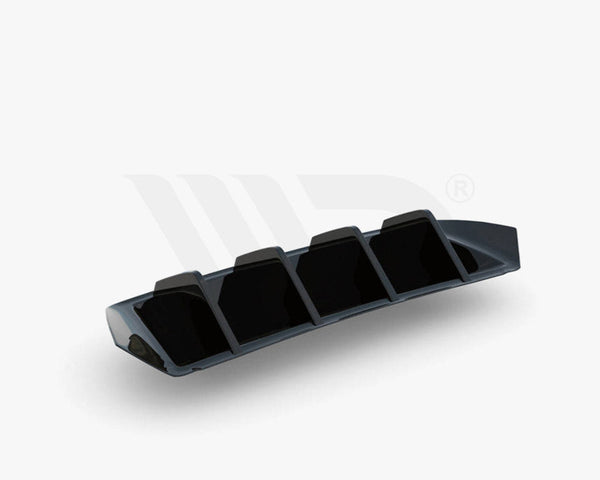 A black, angular aerodynamic component with four vertical fins, resting on a white surface. Text below reads: "WORLDWIDE LEADER IN AERODYNAMIC COMPONENTS."