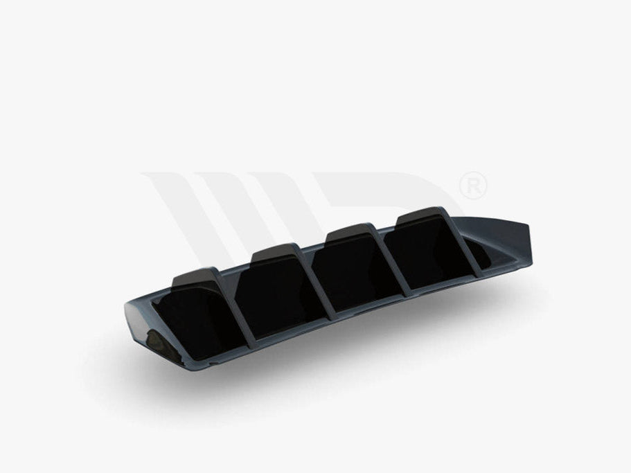 A black, angular aerodynamic component with four vertical fins, resting on a white surface. Text below reads: "WORLDWIDE LEADER IN AERODYNAMIC COMPONENTS."