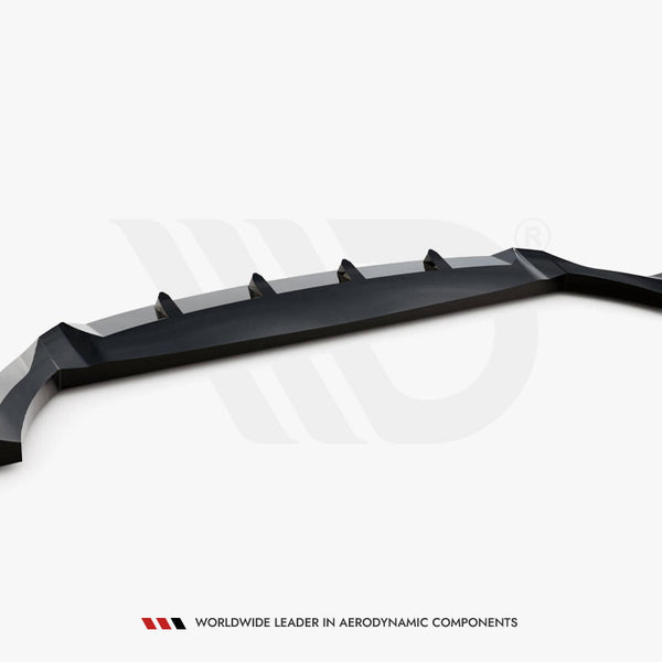 A sleek, black car diffuser with fins is positioned on a plain white background. Text reads: "WORLDWIDE LEADER IN AERODYNAMIC COMPONENTS."