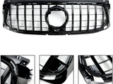 A black car grille with a distinctive grid pattern and central circular emblem is displayed in close-up detail. It is surrounded by a plain white background, with three additional detailed close-up views of different sections of the grille.