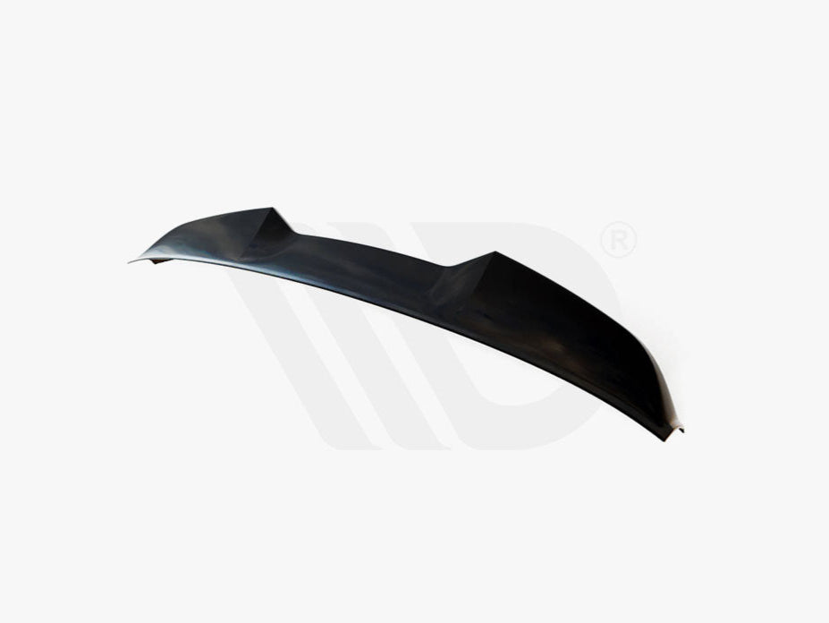 A black car spoiler angled slightly upward, placed on a plain white background. Text reads: "WORLDWIDE LEADER IN AERODYNAMIC COMPONENTS."