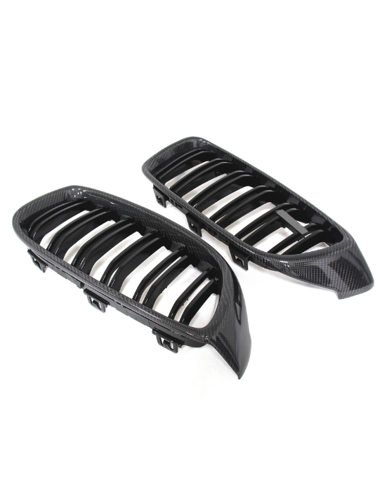 Two black car grilles with horizontal slats are positioned on a white background, showcasing their sleek, aerodynamic design.