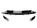 Front bumper lip splitter and two side winglets, designed to enhance aerodynamics, lie on a white background. The glossy black surface and angular design are prominent features.