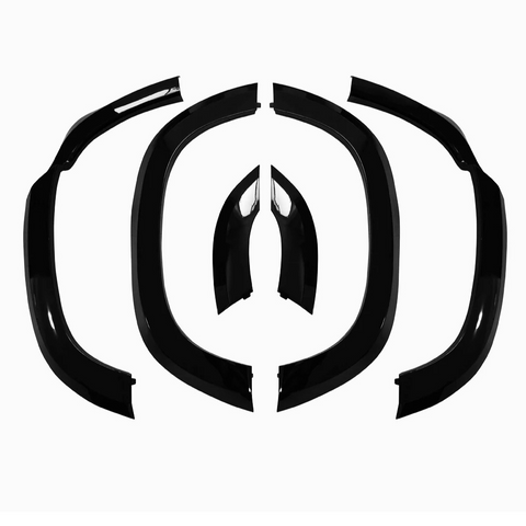 Black car fender flares are displayed in a symmetrical layout, with various curved segments, against a plain white background.