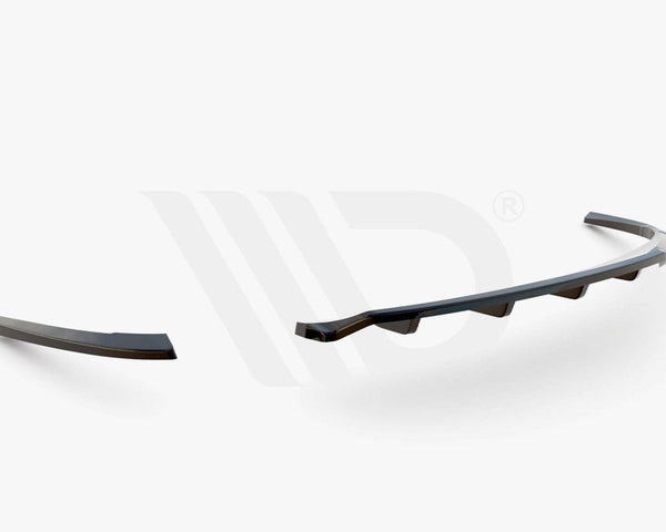 A three-piece black aerodynamic car component lies on a plain white background. Text below reads "WORLDWIDE LEADER IN AERODYNAMIC COMPONENTS."