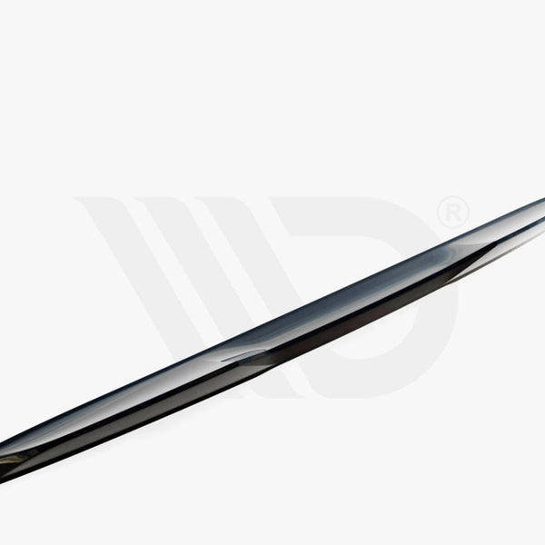 A sleek, elongated car spoiler lies diagonally on a plain white background. Text below reads: "WORLDWIDE LEADER IN AERODYNAMIC COMPONENTS."