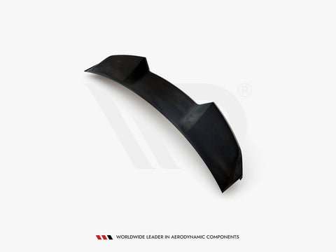 A black car spoiler, featuring aerodynamic contours, sits isolated on a white background. Text below reads: "Worldwide Leader in Aerodynamic Components."