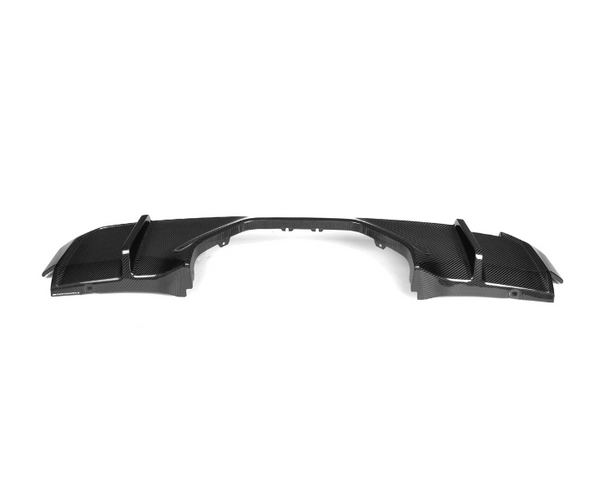 Carbon fiber car bumper diffuser; resting on a white background, highlighting sleek, aerodynamic contours with subtle grooves and cutouts.