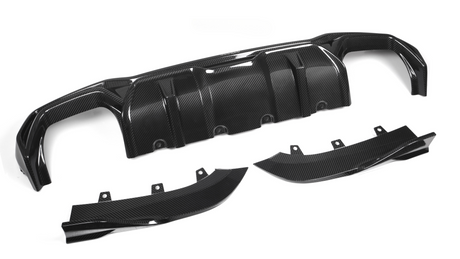 A glossy black carbon fiber car diffuser rests on a plain white background, consisting of one large central piece and two smaller side components with visible bolt holes.