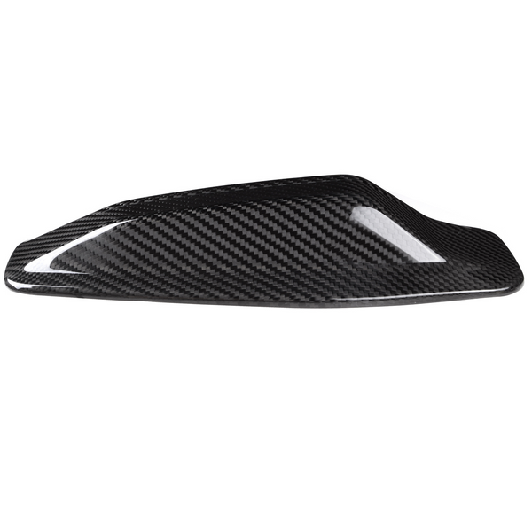 A sleek, black carbon fiber car mirror cap rests on a white background, showcasing its shiny, textured surface designed for aerodynamic enhancement.