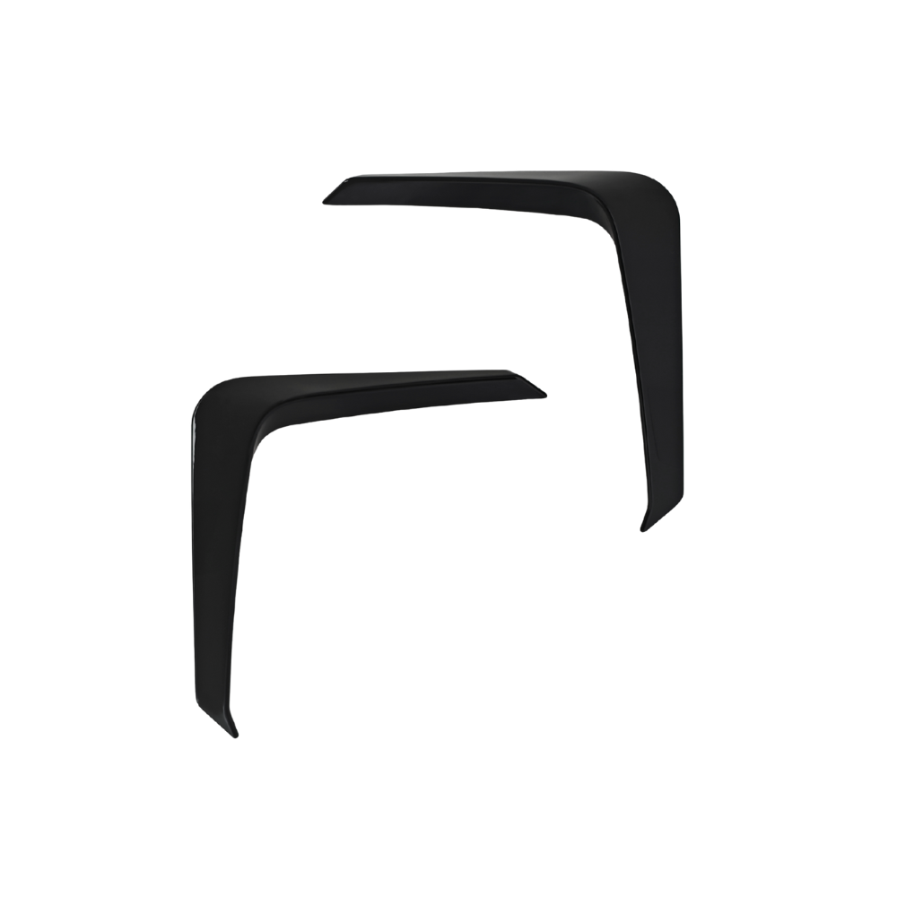 Two black, angled objects are positioned facing each other, resembling boomerangs. They are set against a plain white background.
