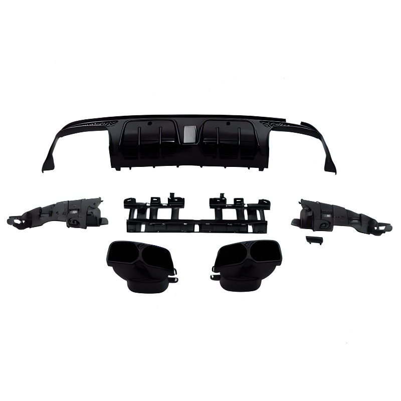 Automobile rear bumper diffuser parts, disassembled and laid out; includes end pieces, exhaust tips, and center grille. The components are black and arranged against a plain white background.
