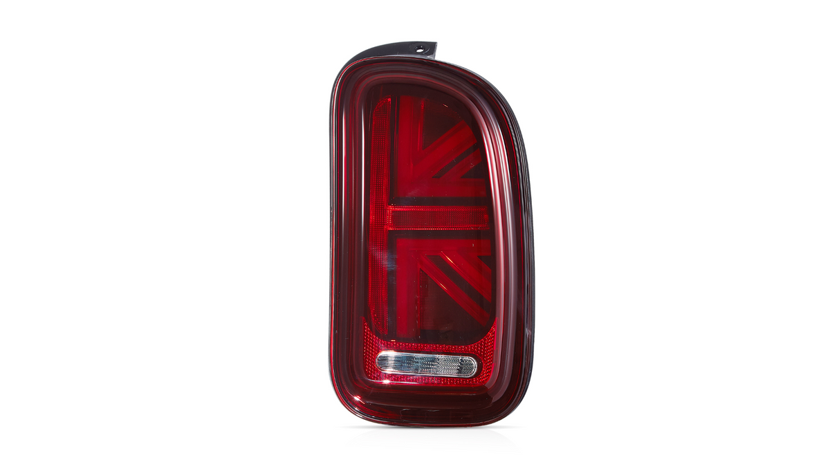 A red car taillight featuring a Union Jack design is displayed against a plain white background.