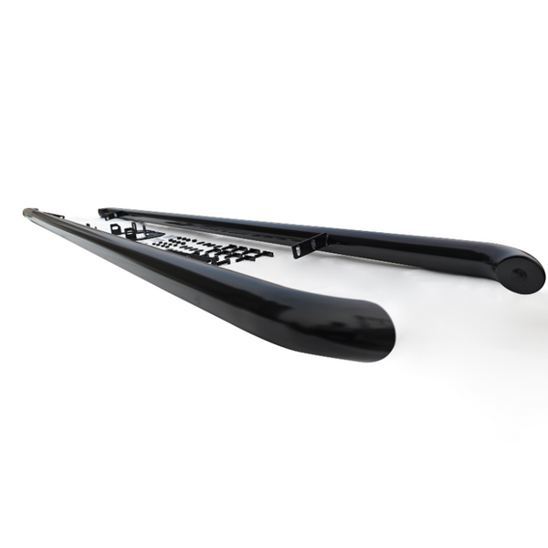 Two black, elongated metal bars lay parallel, displaying mounting brackets and hardware, arranged on a smooth white surface, likely for vehicle installation. No text is present.