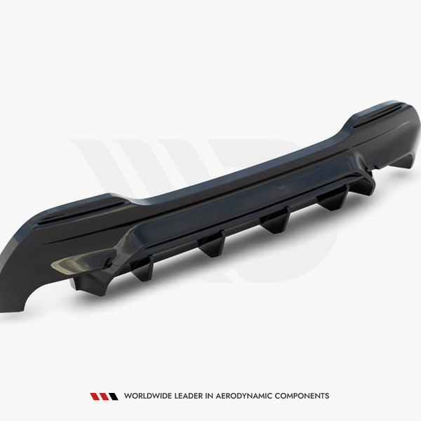 A glossy black car bumper is displayed on a white background, showcasing aerodynamic features. Text at the bottom reads, "WORLDWIDE LEADER IN AERODYNAMIC COMPONENTS."