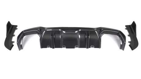 A black carbon fiber car diffuser with a textured surface, positioned centrally with two smaller side pieces detached, set against a plain white background.