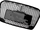 A black car grille with a hexagonal mesh pattern and an attached rectangular mounting plate on the back, suitable for securing the grille to a vehicle.