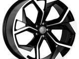 A black and silver alloy wheel features a dynamic, multi-spoke design, with the Audi logo at the center. It is displayed on a white background, emphasizing its sleek appearance.