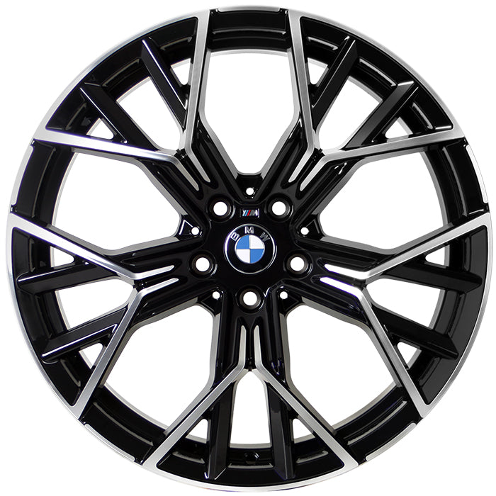 A metallic, multi-spoke alloy wheel with BMW logo at the center, designed for vehicles, displayed against a white background. The spokes feature a black and silver finish with intricate angles.