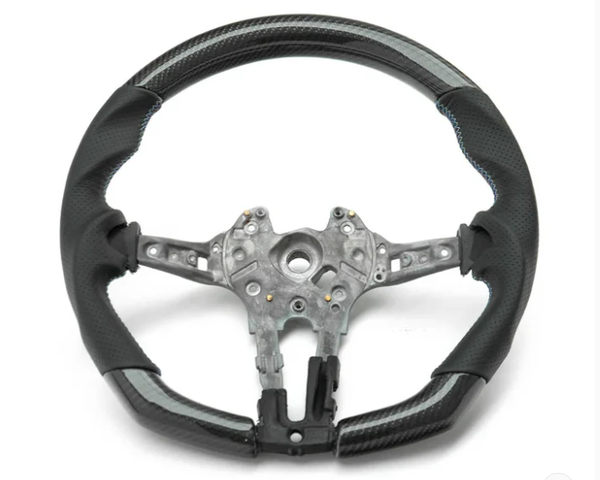 A partially assembled car steering wheel is shown, featuring a metallic central frame with exposed wiring, surrounded by a two-tone black and grey perforated leather grip, against a plain white background.