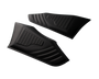 Two black, textured rubber pads feature a honeycomb pattern, lying side by side on a white surface, designed likely for gripping or protective use.
