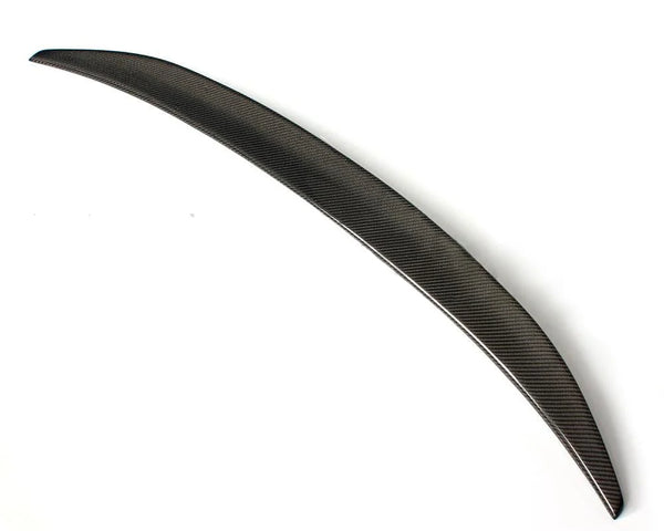 A sleek, lightweight carbon fiber car spoiler is shown, arched slightly, resting against a plain white background.