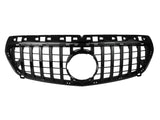 A black car grille featuring vertical and horizontal slats, with a prominent central circular opening, is displayed against a plain white background.