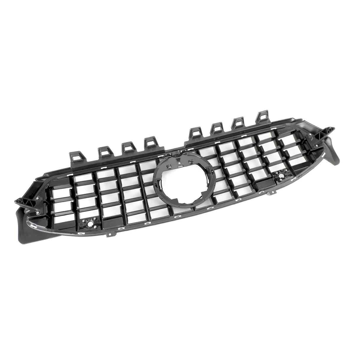 A black car grille features a grid pattern with a central circular opening, likely for an emblem. It's positioned against a plain, white background.