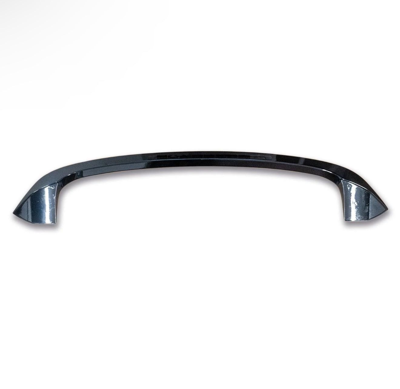 A chrome metal handle with a sleek, curved design is positioned horizontally against a plain white background, reflecting light subtly on its polished surface.
