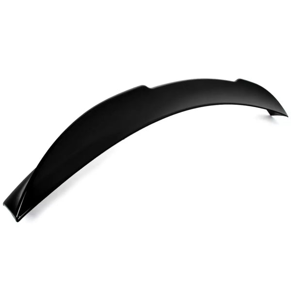 A black, curved car spoiler rests on a plain white background, displaying its smooth, aerodynamic design intended for vehicle performance enhancement. No text present.