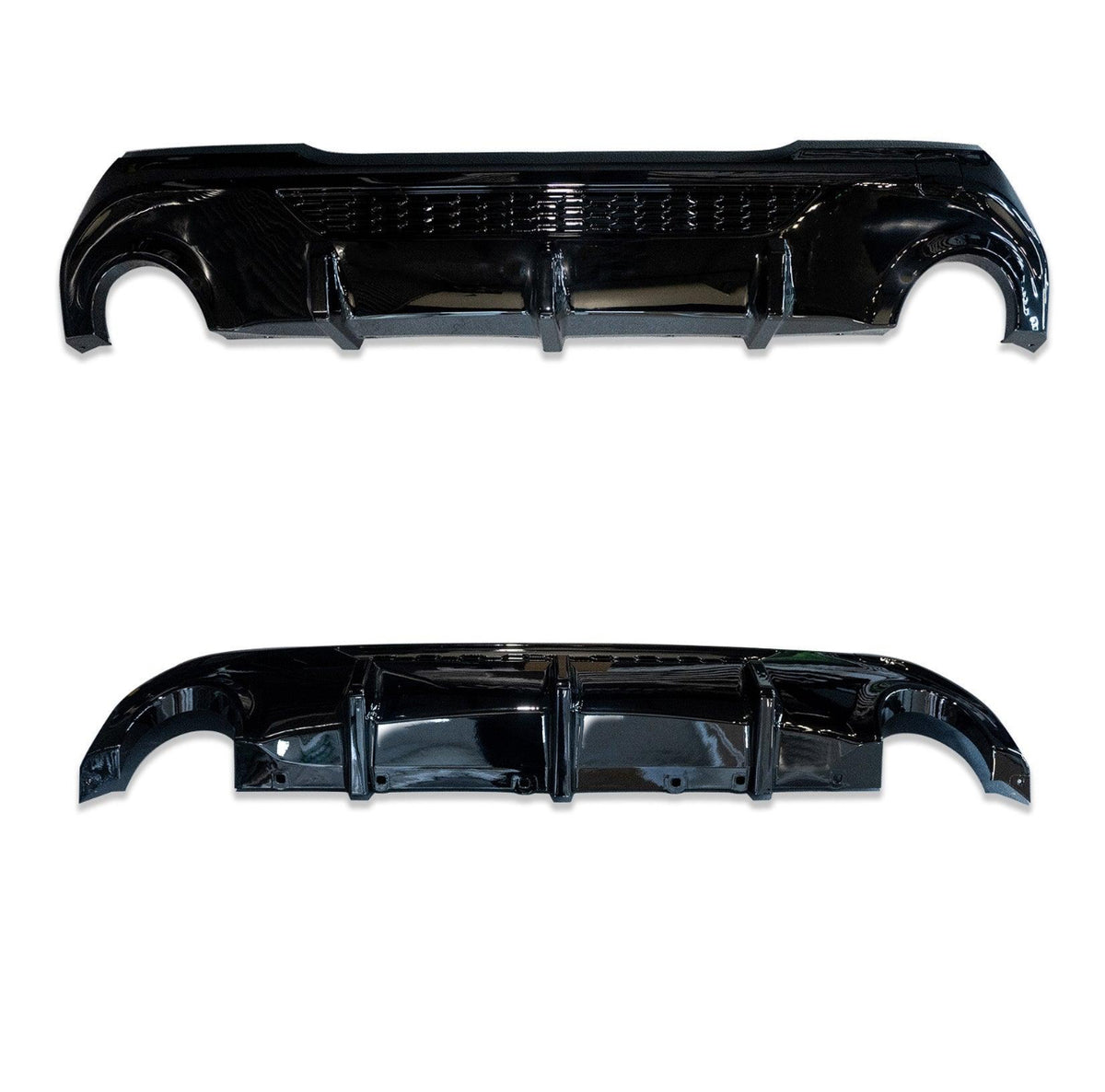 A pair of glossy black car diffusers, each featuring curved edges and vertical fins, positioned on a plain white background.