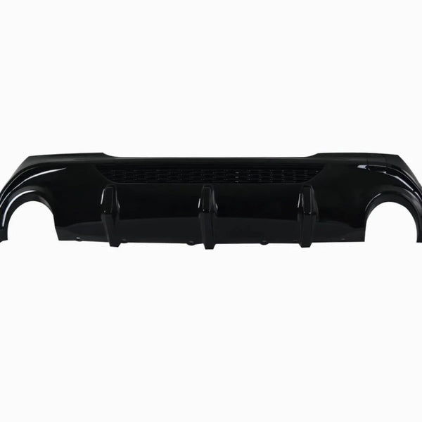 A glossy black car rear bumper diffuser lies horizontally. It features three vertical fins and a mesh section, isolated against a plain white background.