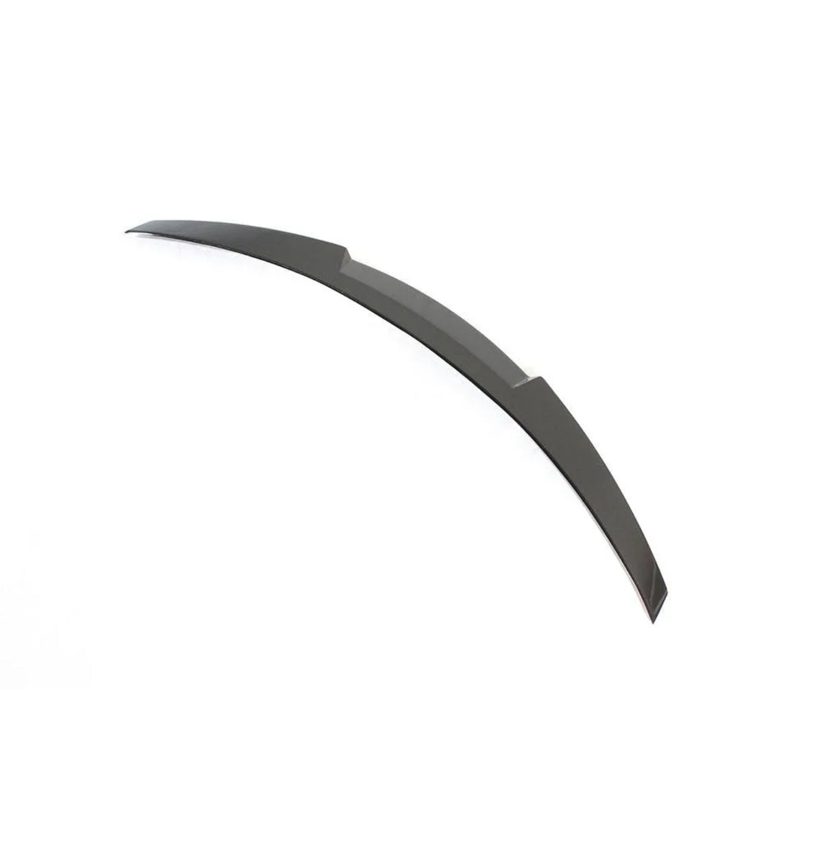 A curved, dark-colored blade-like object lies flat on a plain white background. It features a smooth surface with slightly angled edges, suggesting a sleek, aerodynamic design.