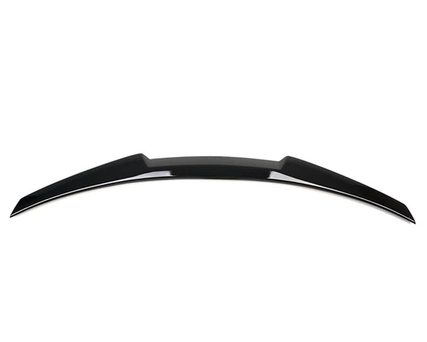 A sleek, black car spoiler is displayed against a plain white background, showcasing its curved design and aerodynamic features.