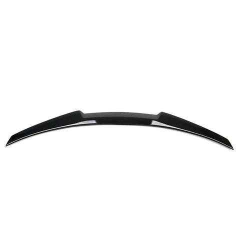 A sleek, black car spoiler is displayed against a plain white background, showcasing its curved design and aerodynamic features.